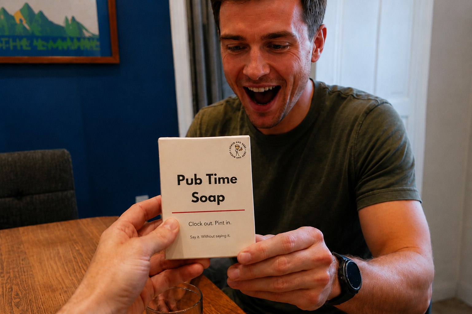 Man holding a 'Pub Time Soap' product packaging with a surprised expression.